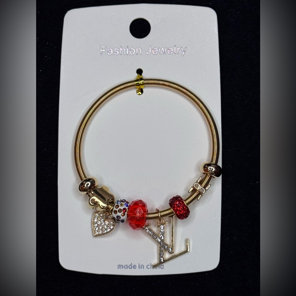 Fashion Jewelry Gold Tone Sparkling Heart
Charm Stretch Bracelet Multi Red